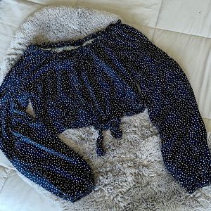 Navy blue cropped blouse.